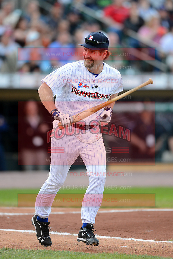 Hall of Fame third baseman Wade Boggs #12 flips his bat reacting to a pop up during the MLB Pepsi Max Field of Dreams game on May 18, 2013 at Frontier Field in Rochester, New York. (Mike Janes/Four Seam Images)