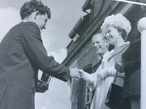 9th August 1961, and Flying Fifteen winner Raymond Gilmore of Kircubbin receives his trophy at RUYC from the Royal couple