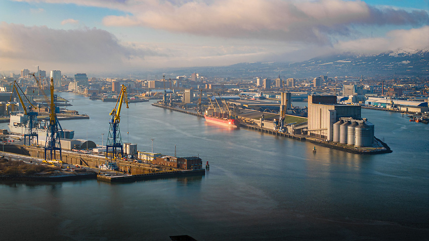 A container ship at Belfast Harbour handling freight at sunset