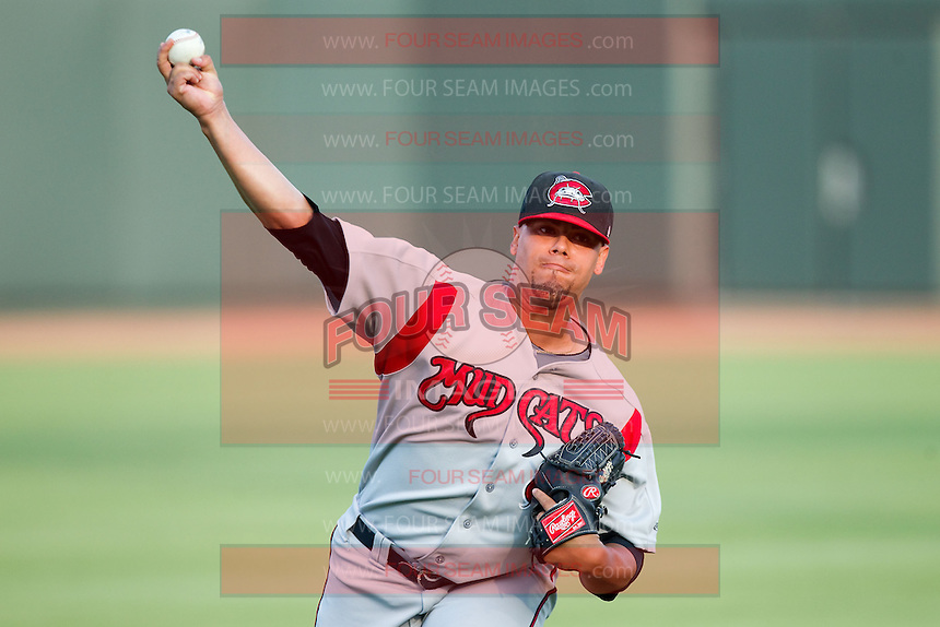 Carolina Mudcats starting pitcher Joseph Colon (29) warms up in the outfield prior to the game against the Winston-Salem Dash at BB&T Ballpark on July 25, 2013 in Winston-Salem, North Carolina. The Mudcats defeated the Dash 5-4. (Brian Westerholt/Four Seam Images)