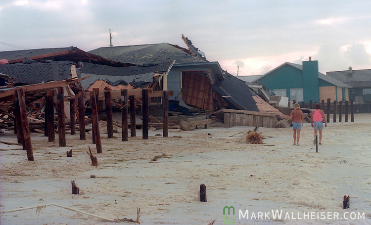 Residents survey the damage to Panama City Beach, Florida after Hurricane Opal impacted the Florida panhandle as a category three storm when it came ashore near Pensacola, Florida October 5, 1995. It was the strongest hurricane of the 1995 season and killed 63 people, 13 in the United States. Hurricane Opal's name was retired the following year.