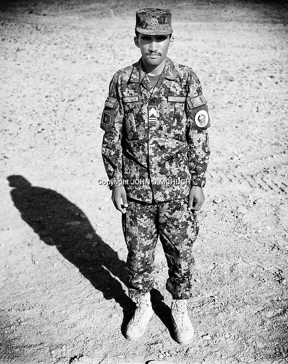 Sergeant Major Mir Agha, of the Afghan National Army, is seen at the Regional Military Training Centre in helmand, 12 November 2012. This portrait was shot on a 5x4 Linhof Technika IV, circa 1959, and a Voigtlander Braunschweig Heliar 15cm lens, circa 1922. (John D McHugh)