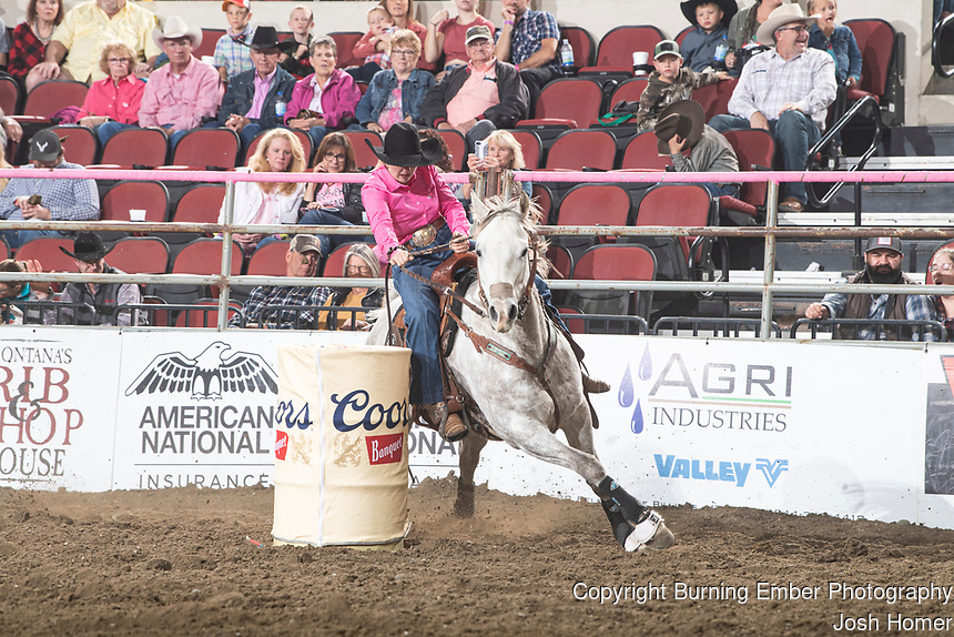 Emmy Dockter during the second performance of the PRCA Rodeo at The NILE 2021 . Photo by Josh Homer. All rights reserved and copyrighted by Burning Ember Photography. Photo Credit must be given on all uses.