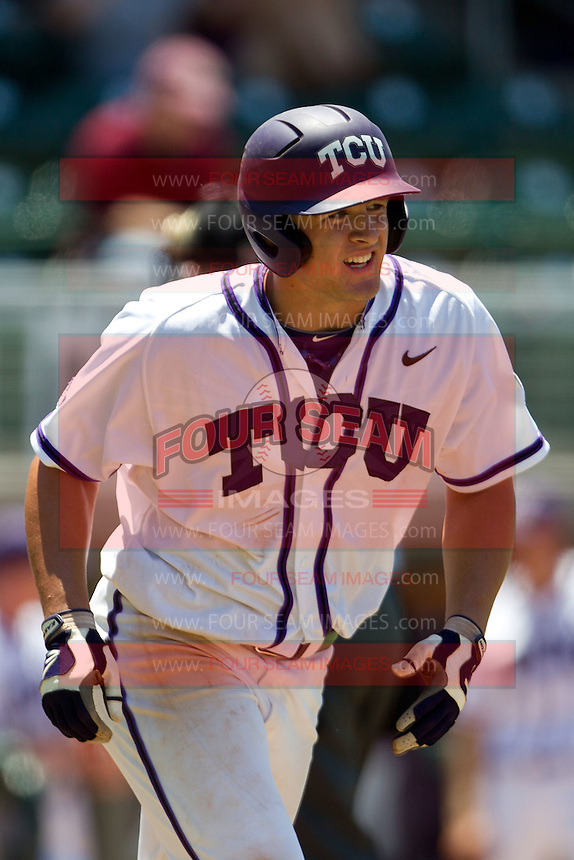 Outfielder Jerrick Suiter #31 of the Texas Christian University Horned Frogs heads to first base after getting hit by a pitch during the NCAA Regional baseball game against the Ole Miss Rebels on June 1, 2012 at Blue Bell Park in College Station, Texas. Ole Miss defeated TCU 6-2. (Andrew Woolley/Four Seam Images)