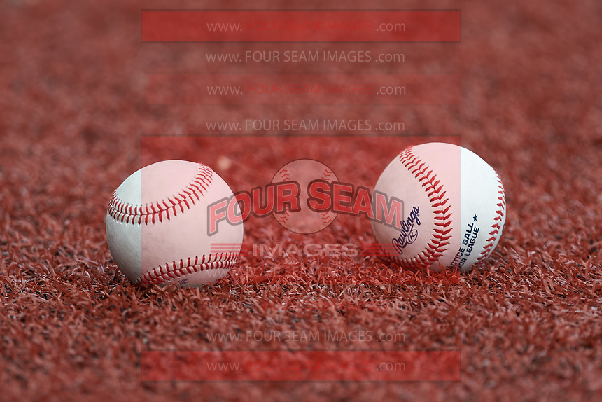 A pair of baseballs sit on the turf prior to game three of the South Atlantic Border Battle at Truist Point on September 26, 2020 in High Pont, NC. (Brian Westerholt/Four Seam Images)