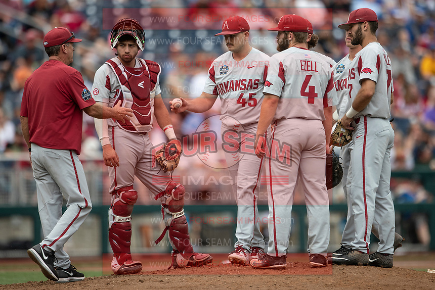 Arkansas Razorbacks pitcher Kevin Kopps (45) leaves the mound after being removed from Game 5 of the NCAA College World Series against the Texas Tech Red Raiders on June 17, 2019 at TD Ameritrade Park in Omaha, Nebraska. Texas Tech defeated Arkansas 5-4. (Andrew Woolley/Four Seam Images)