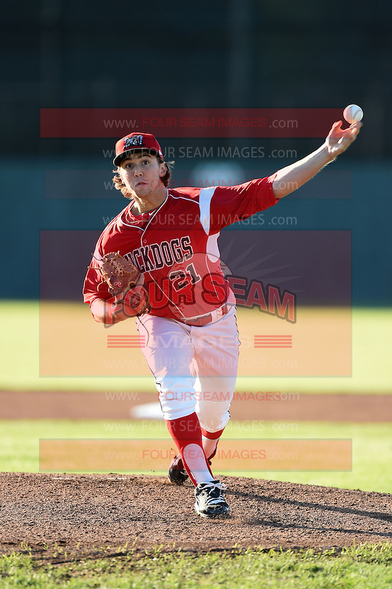 Batavia Muckdogs pitcher Michael Mader (21) delivers a warmup pitch during a game against the Lowell Spinners on July 16, 2014 at Dwyer Stadium in Batavia, New York. Lowell defeated Batavia 6-4. (Mike Janes/Four Seam Images)