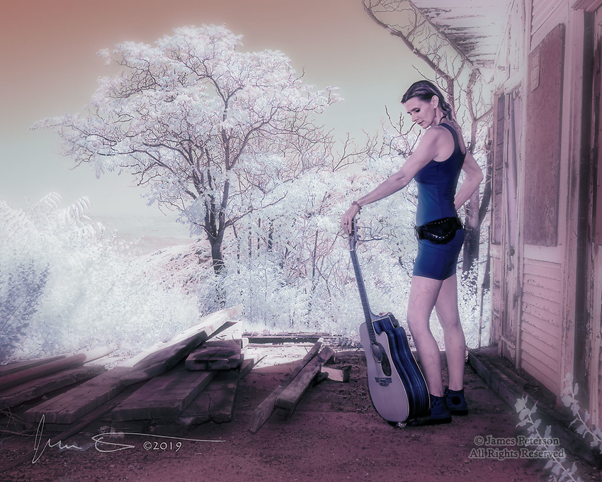 Facing A New World. Winter Amy, lead singer and guitarist with her Sedona band The Fey, is also a fine photographer’s model. In this environmental portrait made in Jerome, Arizona, she’s all set to head out and conquer a newly discovered infrared planet. This image was captured during a recent workshop at Jerome’s Red Bench Studio.<br />
<br />
Image ©2019 James D Peterson