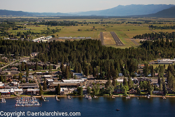 aerial photograph of central McCall, Idaho and the Payette Lake waterfront with McCall Municipal Airport (KMYL) in the background