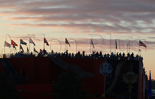 01.10.2016. Chaska, MN, USA. Fans wait in the grandstands on the first tee as the sun comes up before the Day 2 morning matches for the 2016 Ryder Cup at Hazeltine National Golf Club. Europe moved closer to USA finishing 6 1/2 to 5 1/2 points after the morning session.