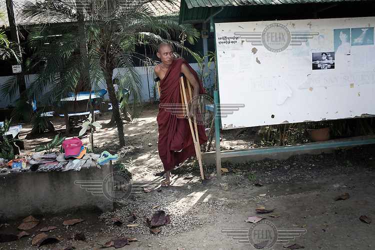 A Burmese monk, who lost the lower part of his left leg, receives treatment at Mae Tao Clinic, on the Burma-Thai border town of Mae Sot. The clinic was established by Dr. Cynthia Maung, a Burmese-Karen woman, to offer free medical services to Burmese who do not qualify for treatment at the local Mae Sot Hospital. He lost his leg after being shot and beaten by the Burmese Army during the 2007 anti Burmese government protests that became known as the Saffron Revolution.