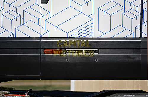 EMPORIA, KS, November 21: Two brand new model EDV 500 Rivian Electric Delivery Vans (EDV) part of the fleet order for Amazon on the back of a transportation lowboy truck parked in the Knights Inn Motel while traveling from the production plant in Normal Illinois to their final destination on November 21, 2021 in Emporia,Kansas. <br />
CAP/MPI/MRN<br />
©MRN/MPI/Capital Pictures