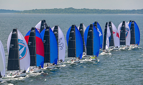 A tightly packed IC37 fleet race downwind in Rhode Island Sound 