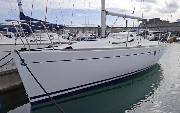 Beneteau First 211 pocket cruiser on double‑axle trailer at Leinster Boats yard. Centre plate raised, recent standing rigging, ready to tow coastal sailing or Dun Laoghaire class racing. Listed Nov 28