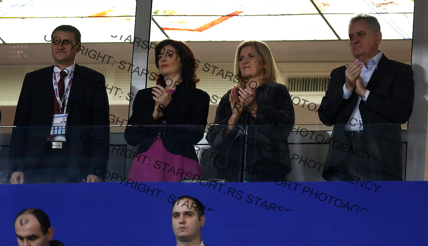 BELGRADE, SERBIA - DECEMBER 16: President of Serbia Tomislav Nikolic (R) with the wife and Ministry of Sport Alisa Maric during the Women's European Handball Championship 2012 medal ceremony at Arena Hall on December 16, 2012 in Belgrade, Serbia. (Photo by Starsportphoto.com)