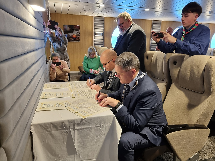 On board the Stena Nordica, held midway on the Irish Sea, was the signing of the ports' town twinning agreement by Fishguard Mayor Cllr Billy Shaw and Rosslare Cathaoirleach Cllr Ger Carthy. The historic ceremony, AFLOAT adds, was also held on the annual Remembrance Service for the route’s S.S. St. Patrick, a steamship sunk in WW2. Attending were members from both councils, Fishguard Chamber of Trade, a Kilmore Scout, Stena Line, and Denise McQuaide (Consul General of Ireland based in Cardiff), who visited Fishguard prior to the sailing to Rosslare.
