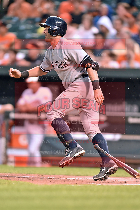 New York Yankees catcher Francisco Cervelli #29 swings at a pitch during a game against the Baltimore Orioles at Oriole Park at Camden Yards August 11, 2014 in Baltimore, Maryland. The Orioles defeated the Yankees 11-3. (Tony Farlow/Four Seam Images)