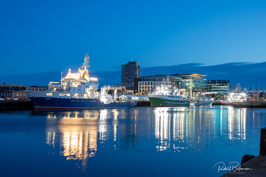 Minister Darragh O’Brien announces a €145m investment for the Irish Coast Guard and maritime projects including a proposed replacement of the Irish Lights vessel Granuaile pictured above left in Cork Harbour .