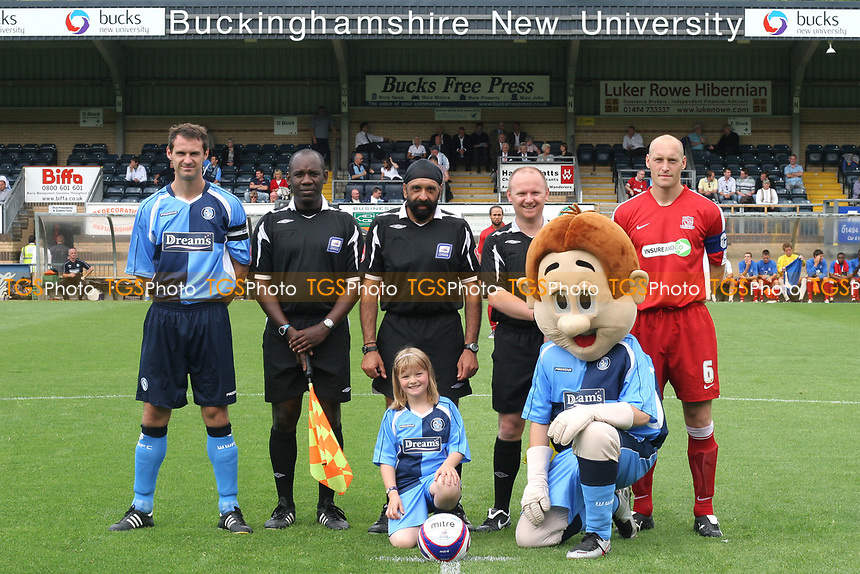 The two captains, David McCracken of Wycombe Wanderers and Adam Barrett of Southend United line up alongside match referee, Mr Jarnail Singh and his two assistant referees during Wycombe Wanderers vs Southend United, Friendly Match Football at Adams Park on 2nd August 2008
