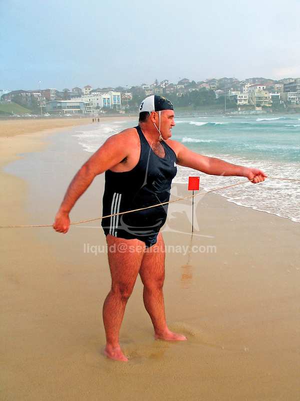Surf life saving team in a training session at Bondi Beach in preparation of a surf carnival.