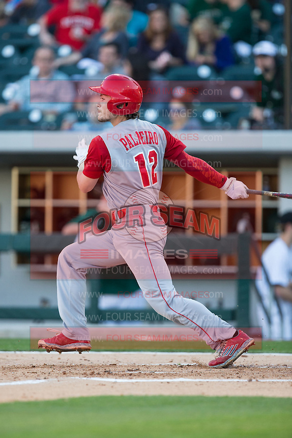 Preston Palmeiro (12) of the North Carolina State Wolfpack follows through on his swing against the Charlotte 49ers at BB&T Ballpark on March 31, 2015 in Charlotte, North Carolina. The Wolfpack defeated the 49ers 10-6. (Brian Westerholt/Four Seam Images)
