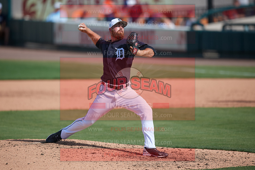 Detroit Tigers relief pitcher Buck Farmer (45) delivers a pitch during a Grapefruit League Spring Training game against the Atlanta Braves on March 2, 2019 at Publix Field at Joker Marchant Stadium in Lakeland, Florida. Tigers defeated the Braves 7-4. (Mike Janes/Four Seam Images)
