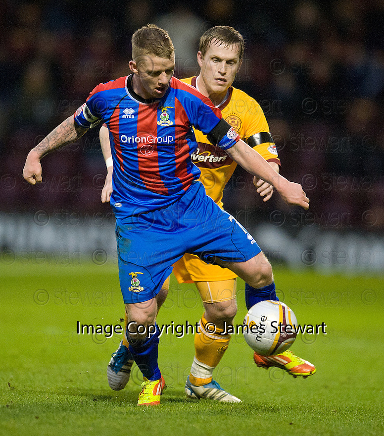CALEY'S JONNY HAYES HOLDS OFF MOTHERWELL'S STEVEN HAMMELL ..14/01/2012 sct_jsp008_motherwell_v_ict .Copyright Pic : James Stewart.James Stewart Photography 19 Carronlea Drive, Falkirk. FK2 8DN Vat Reg No. 607 6932 25.Telephone : +44 (0)1324 570291 .Mobile : +44 (0)7721 416997.E-mail : jim@jspa.co.uk.If you require further information then contact Jim Stewart on any of the numbers above.........