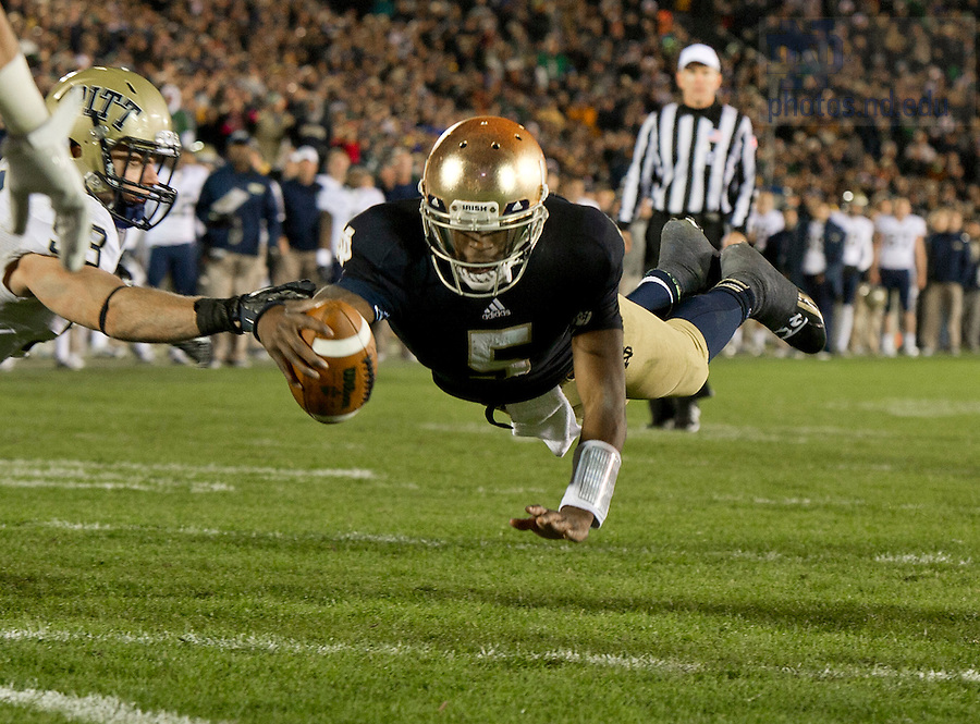 Nov. 3, 2012; Quarterback Everett Golson dives into the end zone to tie the game in a two-point conversion against Pittsburgh in the fourth quarter. Photo by Barbara Johnston/University of Notre Dame