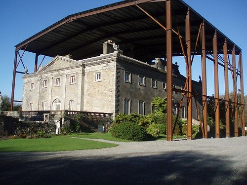 In a distinguished professional career as a Quantity Surveyor, Larry Martin was senior partner in DL Martin & Partners, with a long list of varied contracts which included this famous temporary roof put over Westport House in Mayo to facilitate a restoration, with conservation being one of the Partnership's many specialities