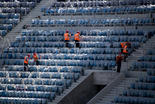 22nd August 2017, Volgograg, Russia; Construction workers installing seats in the grandstands of the Volgograd Arena in Volgograd, Russia, 22 August 2017. The city is one of the locations for the Russia 2018 FIFA World Cup.