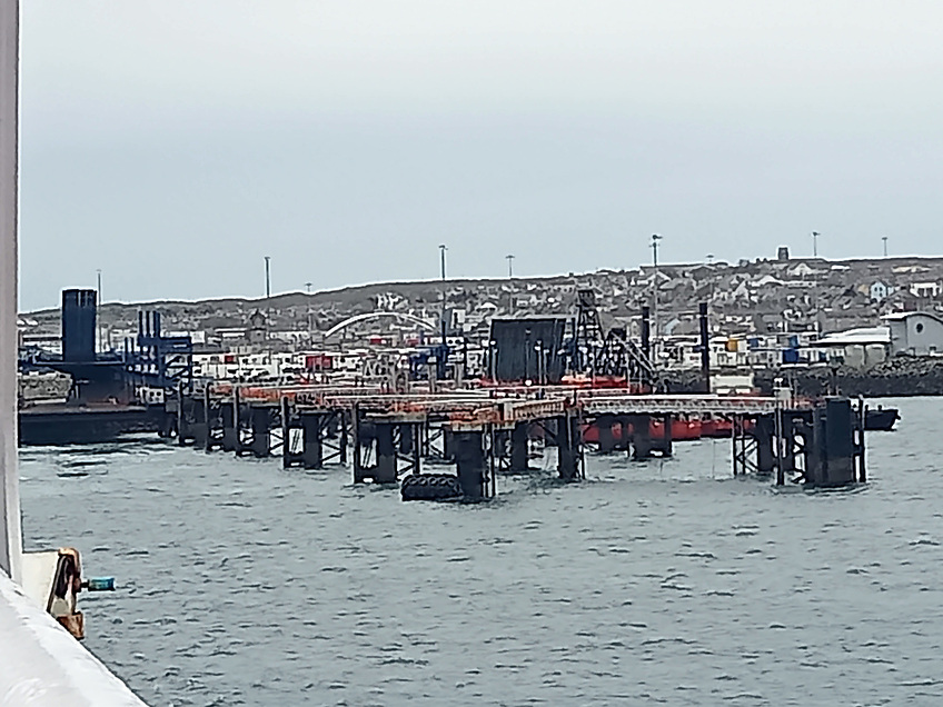 The above April scene shows the Port of Holyhead’s two terminal linkspan berths at the North Wales outer harbour on Salt Island, where on the left is Terminal 5 (T5), which was damaged during a ‘berthing incident’ due to severe weather conditions on Friday, 4 December, However, despite the setback, the port ferry continues to partially function, as the adjacent Terminal 3 (T3) on the right is now shared by Stena Line and Irish Ferries and is running to a revised but full sailing schedule. The last major incident took place at T3 just before the peak of Storm Darragh in December last year, causing considerable disruption in the lead-up to the festive season. 