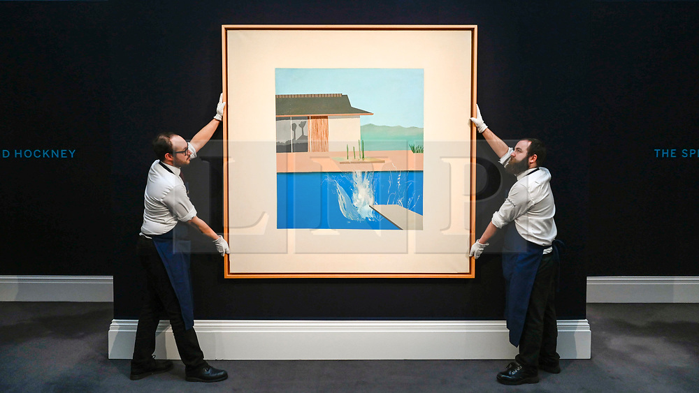 © Licensed to London News Pictures. 07/02/2020. LONDON, UK. Technicians present ''The Splash'' by David Hockney, (Est. £20,000,000 - 30,000,000). Preview of Sotheby's Contemporary Art Sale in their New Bond Street galleries. Works by artists including Francis Bacon, Yves Klein, Jean-Michel Basquiat and David Hockney will be offered for auction on 11 February 2020. Photo credit: Stephen Chung/LNP