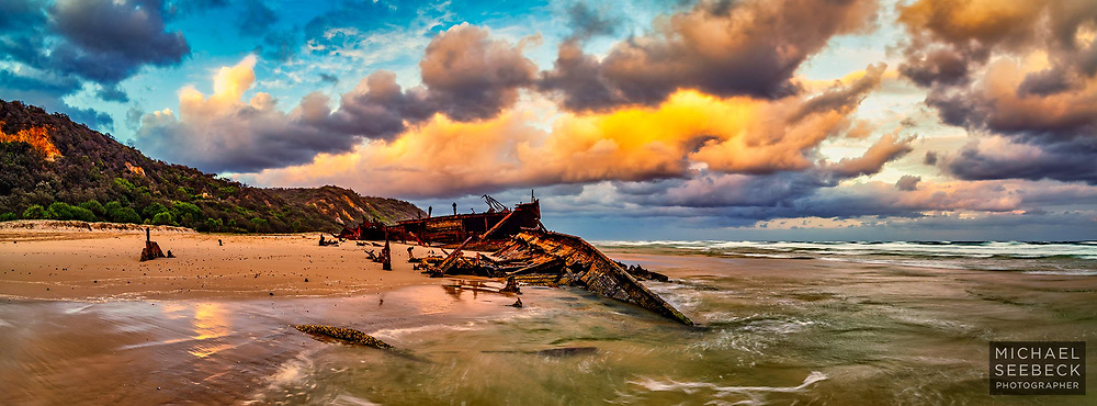 A spectacular golden sunset captured from the Maheno Wreck on 75 mile beach on Fraser Island.<br />
<br />
Code: AAQR0001<br />
<br />
2.7:1 Panoramic Print. Available in 40in (100cm) to 70in (178cm) sizes. ('Image Size' below not indicative of print size and resolution.)<br />
<br />
Limited Edition of 50 only.<br />
<br />
Add to Cart to view print options and pricing.