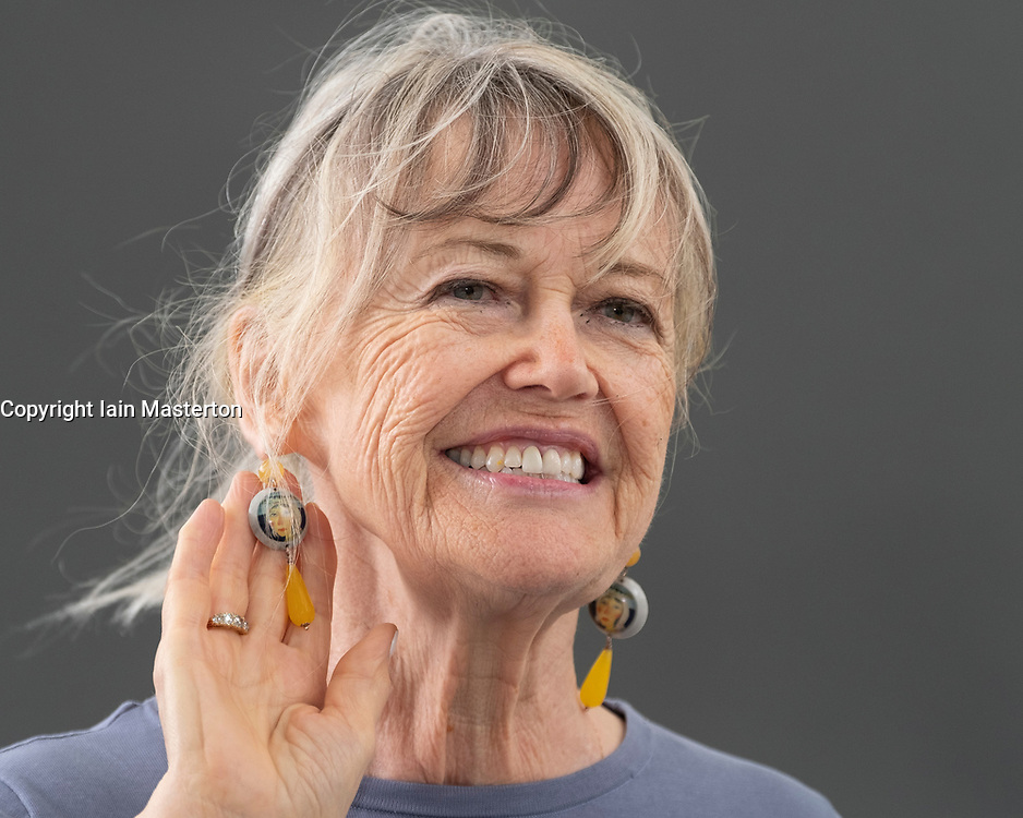 Edinburgh, Scotland, UK; 17 August, 2018. Pictured; Helen Bellany, ( displaying earrings using her husband's paintings) widow of artist John Bellany, talks about the mystery, poetry and passion that was at the core of their life together in her book "The Restless Wave".