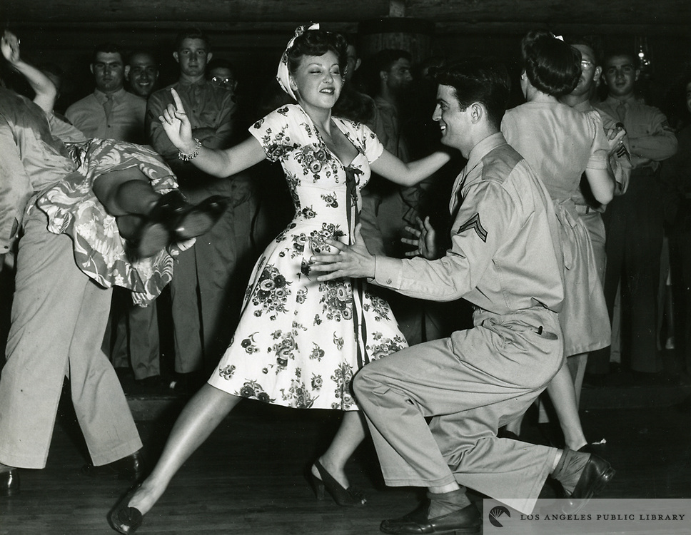 1943 Fay McKenzie dancing the Jitterbug with a serviceman at the Hollywood Canteen
