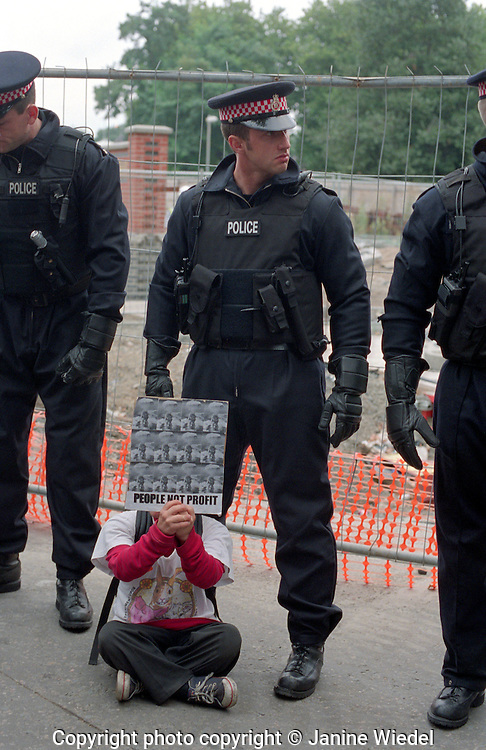 Confrontation between protesters and police outside Arms Trade Fair in Excel Center london 2003