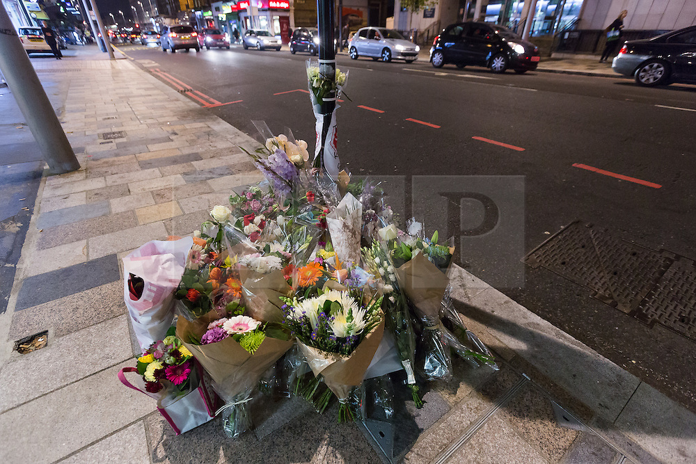 © Licensed to London News Pictures. 31/10/2016. LONDON, UK. Flowers and tributes to cyclist, Lucia Ciccioli are placed on Lavendar Hill where she was killed. The campaign group, 'Stop Killing Cyclists' held a die in protest at the spot where she died following a collision with a Heavy Goods Vehicle (HGV) lorry one week ago. Cycling groups and their supporters are calling for the Mayor of London, Sadiq Khan to ban HGV's from the capital. Photo credit: Vickie Flores/LNP