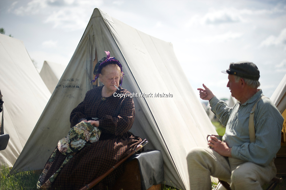 Donna Elliot, from Toronto, converses in camp during the Chancellorsville 150th reenactment in Spotsylvania, VA on May 4, 2013.