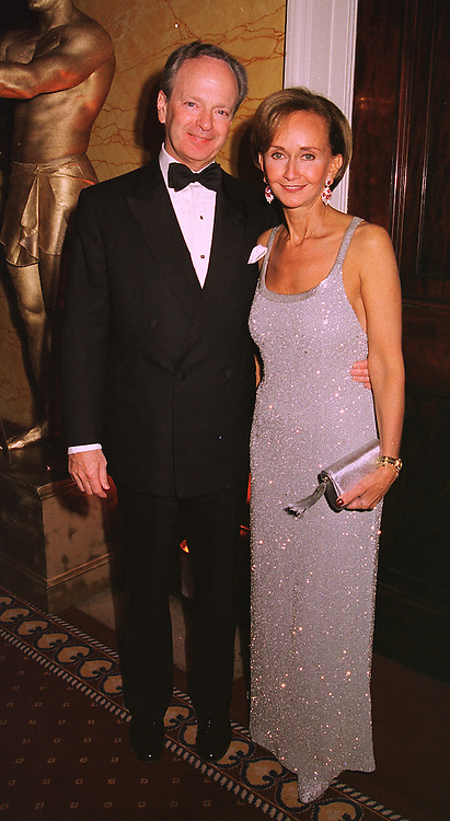 YVONNE, MARCHIONESS OF BRISTOL and her fiancee MR CHARLES NORRIS, at a party in London on 30th January 1999.MNP 26