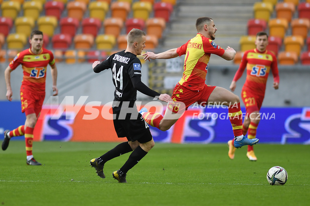 2021.04.09 Bialystok Pilka nozna PKO Ekstraklasa sezon 2020/2021. Jagiellonia Bialystok (zolto-czerwone) - Cracovia Krakow N/z (L-P) Dawid Szymonowicz Przemyslaw Mystkowski fot Michal Kosc / AGENCJA WSCHOD