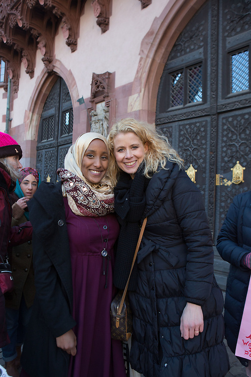 The Women's March Frankfurt on January 21, 2017 was attended by over 2,100 people. Photographer Jenny Mayfield captured the organizers, volunteers and participants as they marched from the Alter Oper to the Römer. The collective chant was "Gemeinsam Stark."