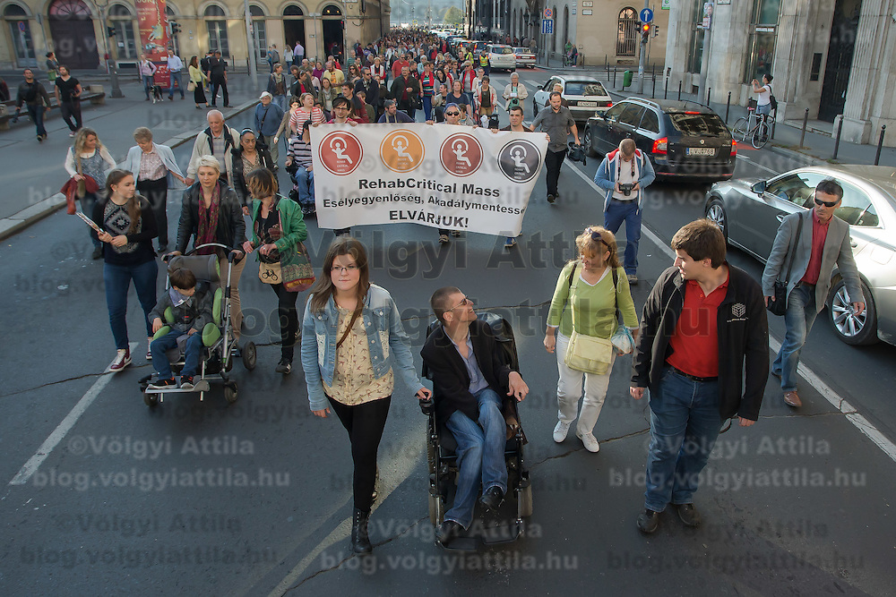Participants of the Rehab Critical Mass demonstrate for better accessibility of disabled people in Budapest, Hungary on October 19, 2014. ATTILA VOLGYI