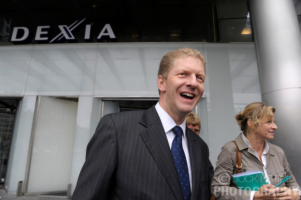 Axel Miller, chief executive officer of the Dexia Group, speaks to members of the media at the Dexia Bank headquarters building in Brussels, Belgium, on Tuesday, Sept. 30, 2008. Belgium and France threw Dexia SA a 6.4 billion-euro ($9.2 billion) lifeline and the chairman and chief executive officer stepped down as the widening financial crisis forced governments to prop up institutions across Europe. Photo © Jock Fistick)