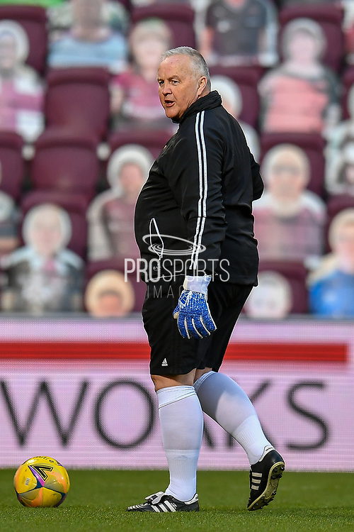 Alloa Athletic goalkeeping coach Alan Fraser during the warm up before the SPFL Championship match between Heart of Midlothian FC and Alloa Athletic FC at Tynecastle Park, Edinburgh, Scotland on 9 April 2021.