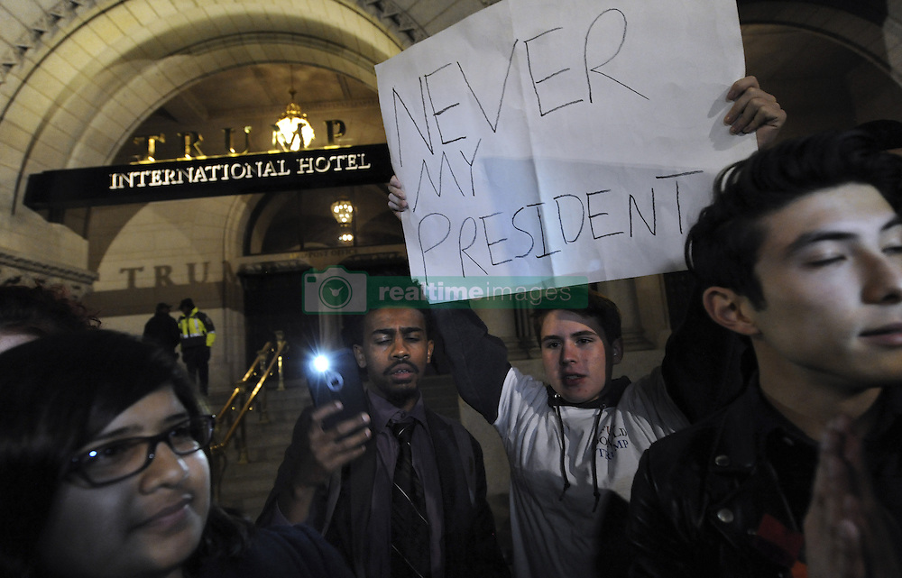 November 11, 2016 - Washington, DC, USA - Protests erupt over 2016 Presidential election results in Washington DC with Donald Trump winning over Hillary Clinton. Clinton supporters take to the streets, stopping at Trump hotel, the White House and Capitol. ''This is the revolution,'' they declared. Not My President Protest(Credit Image: © Carol Guzy via ZUMA Wire)