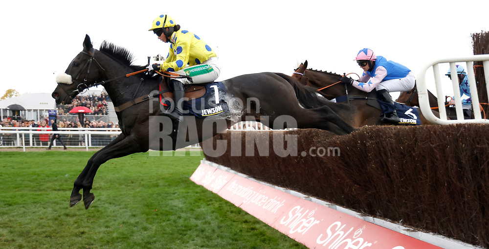 Yala Enki and Brtony Frost (blue spots) winning The Jewson Click And Collect Handicap Chase<br />
Cheltenham 14.11.21<br />
Pic Dan Abraham-focusonracing.com