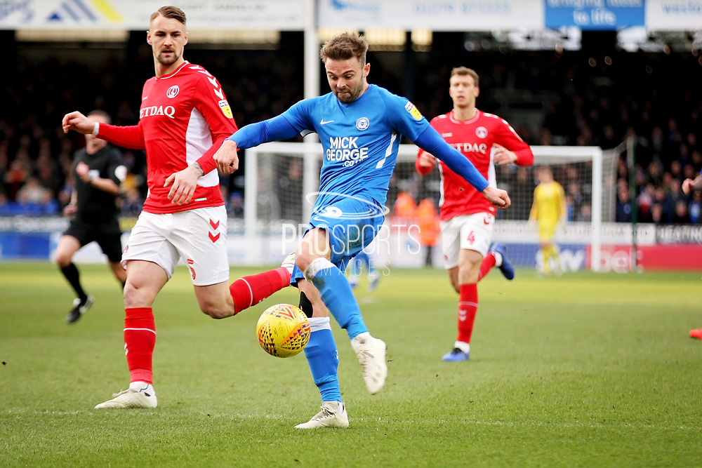 Peterborough Utd forward Matthew Godden (9) gets in an early shot during the EFL Sky Bet League 1 match between Peterborough United and Charlton Athletic at London Road, Peterborough, England on 26 January 2019.