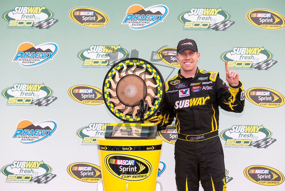 AVONDALE, AZ - MAR 03, 2013: Carl Edwards (99) ends his losing streak by winning the Subway Fresh Fit 500 at Phoenix International Raceway in AVONDALE, AZ.
