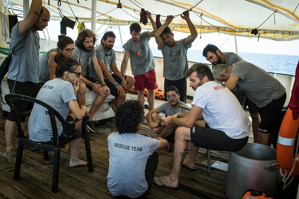 June 30th, 2017, Central Mediterranean. Riccardo Gatti, Head of Mission, comunicates the crew the death of Samuel the day after droping him off in Lampedusa. Evacuation of Samuel Osei, a 36-year-old man from Ghana severely sick after being rescued in the sea. NGO Proactiva Open Arms in their 20th rescue mission in the Central Mediterranean Sea on board of Golfo Azzurro vessel (photo Edu Bayer)