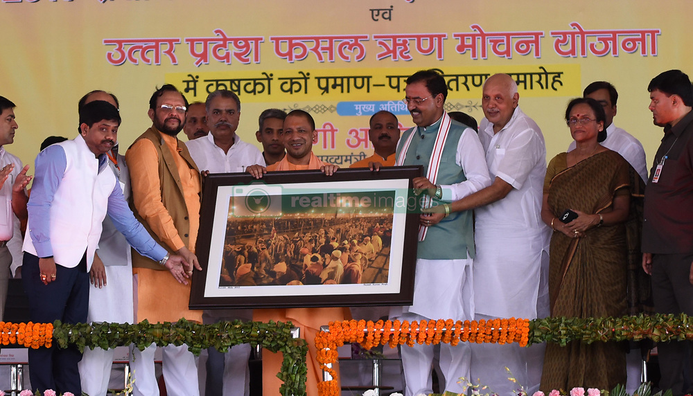 September 6, 2017 - Allahabad, Uttar Pradesh, India - Allahabad: BJP leader offer a photo of Kumbh area to Uttar Pradesh Chief minister Aditya Nath during a programme at Parade ground in Allahabad on 06-09-2017. Photo by prabhat kumar verma (Credit Image: © Prabhat Kumar Verma via ZUMA Wire)